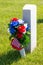 Military gravestone with American flag