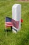 Military gravestone with American flag
