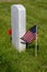 Military gravestone with American flag
