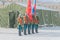 Military guard of honor with banners and standard, in winter, Ru