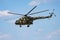 Military helicopter at air base. Air force flight operation. Aviation and aircraft. Air defense. Military industry. Fly and flying