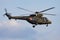 Military helicopter at air base. Air force flight operation. Aviation and aircraft. Air defense. Military industry. Fly and flying