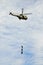 Military helicopter carrying soldiers