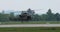 Military Helicopter Precision Landing. Side View