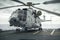 Military helicopter on warship board in the sea. Navy helicopter on board the aircraft carrier. Created with Generative