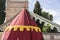 Military,medieval tent of different colors with coats of arms an