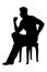 Military officer sits on chair silhouette vector