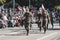 Military people parading at the celebration of the 119 years of