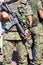 Military personnel holding assault rifle - Series 3