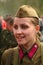 Military re - enactor in Russian soviet uniform world war II. Soviet female soldier in uniform of World War II