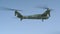 Military reconnaissance unobtrusive drone in flight. The theme of modern high-tech warfare. Artillery aiming with a drone