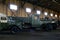 Military russian green army vehicle standing in the hangar. The military vehicle support Ukraine. War russia. Out of