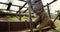 Military soldiers climbing rope during obstacle course 4k