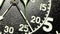 Military stopwatch clock face close up.