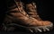 Military tactical boots on black background
