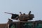 Military tank army vehicle close up of guns and military personel giving thumbs up. Military and war concept of power, force,