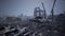 Military tanks from the second world war lie smashed on the battlefield next to human remains and the ruins of houses