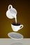 Milk being poured into small cup of coffee. 3d