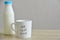 Milk bottle and a white mug