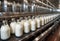 Milk bottles moving along a conveyor belt. Generative AI