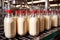 Milk bottling line at dairy processing manufacturing factory plant, agriculture industry