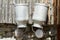 Milk cans hanging on a wood fence Country scene, Austria, Tyrol