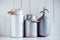 Milk cans and a siphon