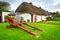 Milk cart at the cottage houses in Adare, Ireland