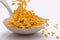 Milk and Cereal being Poured into a White Minimalistic Bowl behind White Background