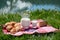 Milk, cheese and bread served at a picnic in an Alpine meadow, S