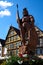 The milk fountain on the market square of Bad Mergentheim, in front of half-timbered houses.