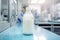 Milk glass bottle in laboratory. Concept for lab grown milk from artificial cultured dairy production