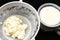 Milk kefir grains, tibetian mushroom sponge witk kitchen sieve and cup of fermented milk