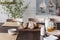 Milk, natural honey and bread on cottage wooden table in dining room interior with poster. Real photo