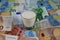 Milk price and agricultural products trend concept: Small glass of milk on euro money bank notes