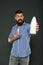 Milk products. Consuming lactose. Healthy nutrition. Yogurt probiotics and prebiotics. Bearded man hold white bottle