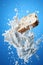 Milk splash on sliced bread against blue background AI Generated