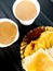 Milk tea or chai with Vada pav the Indian desi burger from Mumbai Maharashtra.