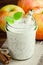 Milkshake with chia seeds on wooden background