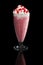 Milkshake strawberry summer cocktail isolated on black
