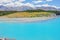 Milky blue of Lake Pukaki with beautiful view on Southern Alps in the background in South Island New Zealand