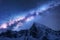 Milky Way above snowy mountains at night. Space