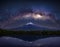 Milky way arch above Mt.Fuji mirroring in lake water