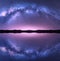 Milky Way arch reflected in water. Night landscape