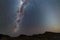 Milky Way arch, stars in the sky, the Namib desert in Namibia, Africa. The Small Magellanic Cloud on the left hand side.