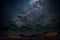 Milky Way arch, stars in the sky, the Namib desert in Namibia, Africa. Some scenic clouds.