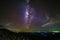 Milky way galaxy with knob stone ground is name Lan Hin Pum viewpoint at Phu Hin Rong Kla National Park in Phitsanulok, Thailand