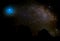 Milky Way Galaxy in Starry Sky with Comet Shooting Through