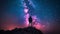 Milky Way galaxy starry sky stars man standing mountain nebula pink and purple