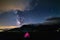 Milky way galaxy stars over the Alps, camping illuminated tent, Mars and Jupiter planet, snowcapped mountain range, astro night sk